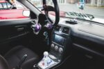 black steering wheel with water droplets car accessories