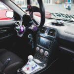 black steering wheel with water droplets car accessories