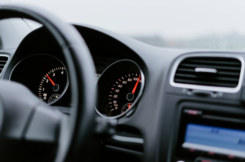 black vehicle dashboard with speedometer on 100 tecnologie automotive Milano